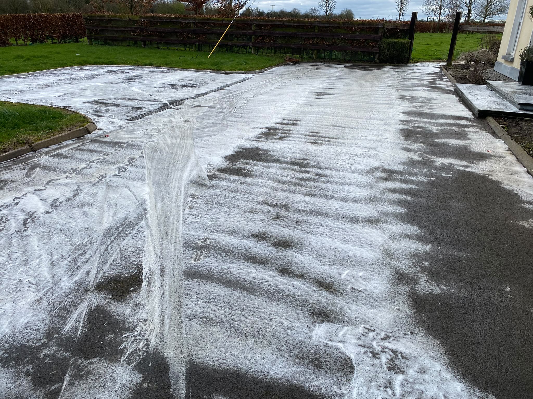 Tarmac being treated with a biocidal wash by Brian Kelly Services